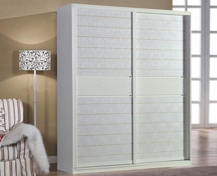 精致皮纹雕刻移门衣柜效果图  缔造温馨之家